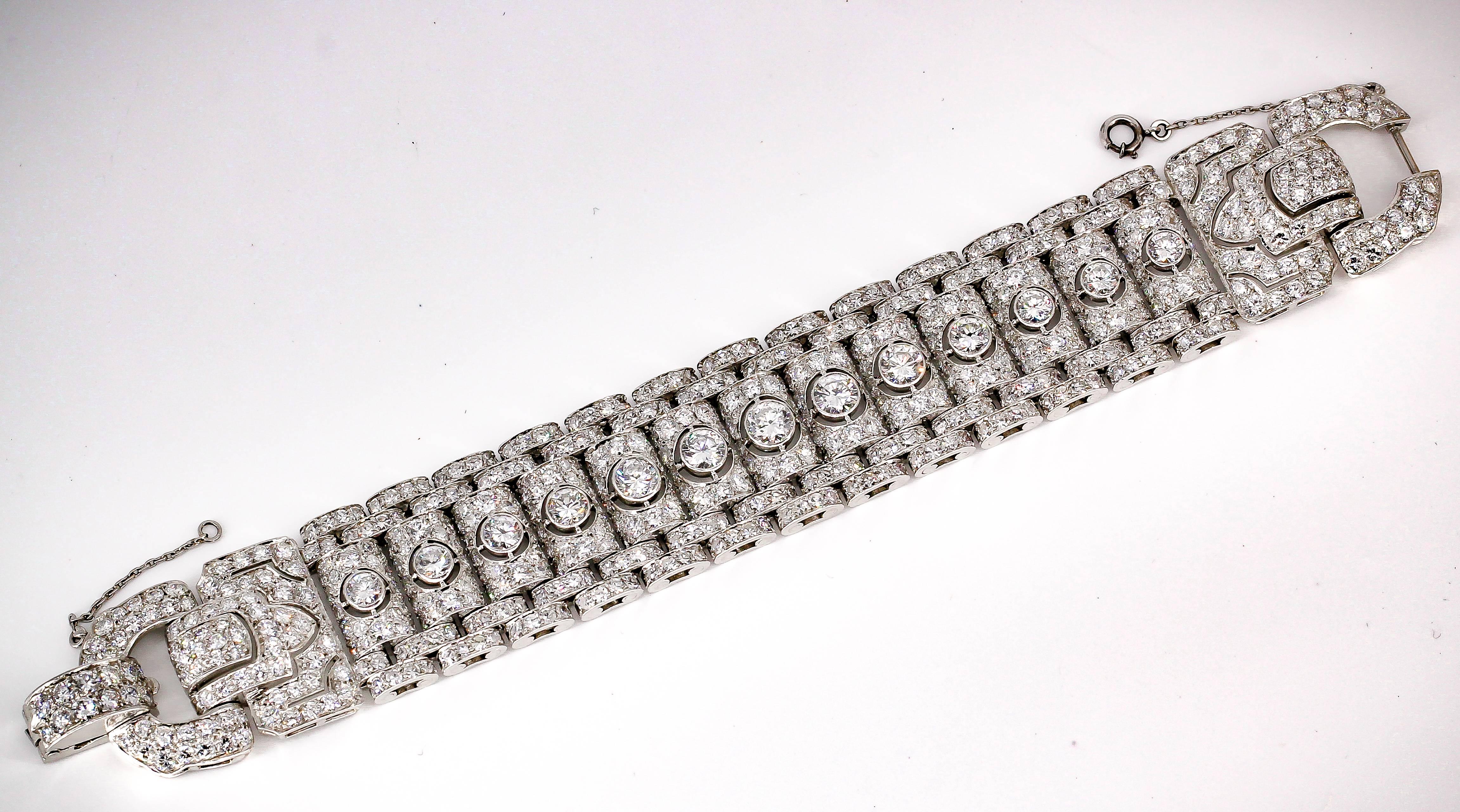 Exceptional diamond and platinum buckle bracelet, circa 1930s. It features high grade round brilliant cut diamonds throughout, approx. 30cts total weight. Superb workmanship and style give this bracelet great presence anywhere you go.