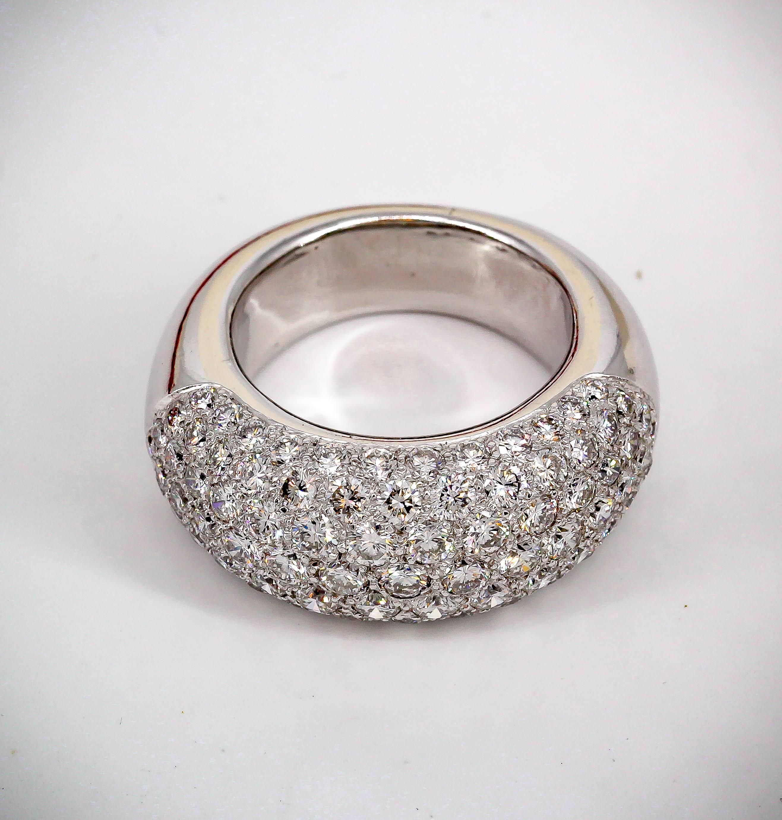 Elegant pave diamond and 18K white gold dome ring of French origin. It features high grade pave diamonds, approx. 4.0-5.0cts total weight, approx G-H VS.  Size 7. 

Hallmarks: French 18K gold assay mark (faint)