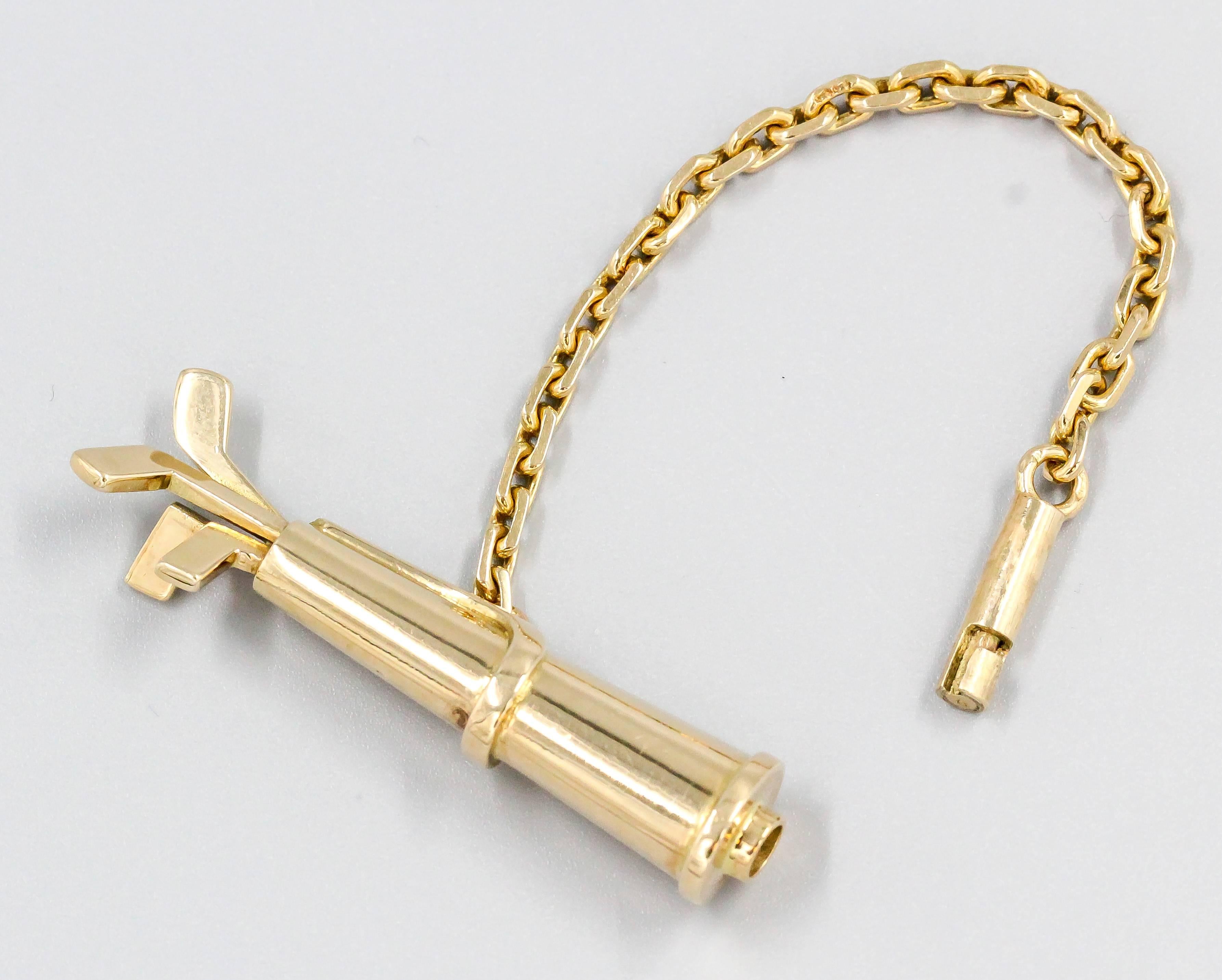 Whimsical 18K yellow gold key chain by Cartier, circa 1980s. Styled as a golf club bag, it offers a wonderful gift idea for a golf enthusiast.
Hallmarks: Cartier, 18k, reference numbers.