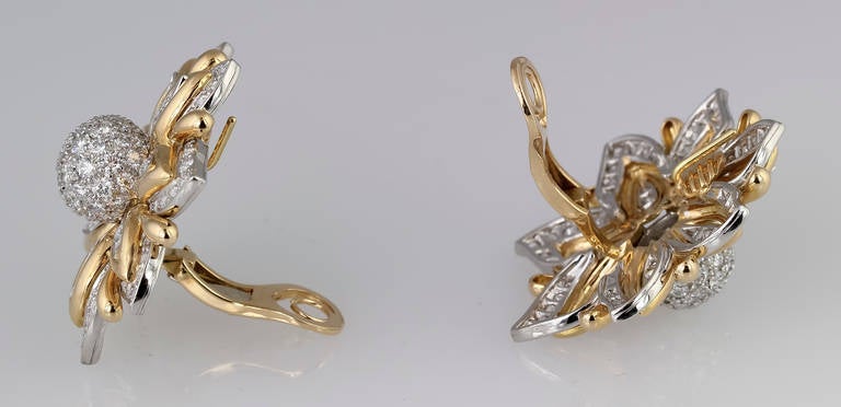 Impressive diamond earclips in platinum and 18K gold from the 