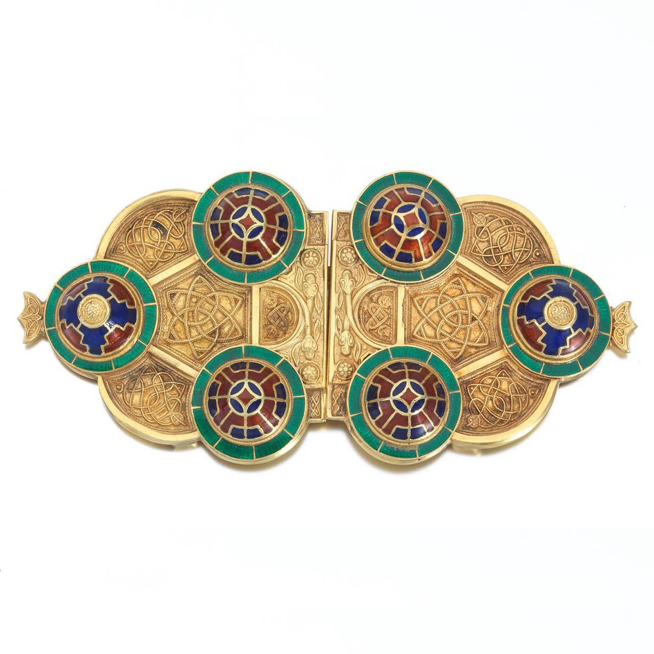 An 18 carat gold two piece Viking belt buckle in neo style, with overall Celtic motifs of intertwined knots and dragons in lot relief, and polychrome enameled dome accents in original box, signed: Hopkins & Hopkins, Goldsmiths and Watchmakers,