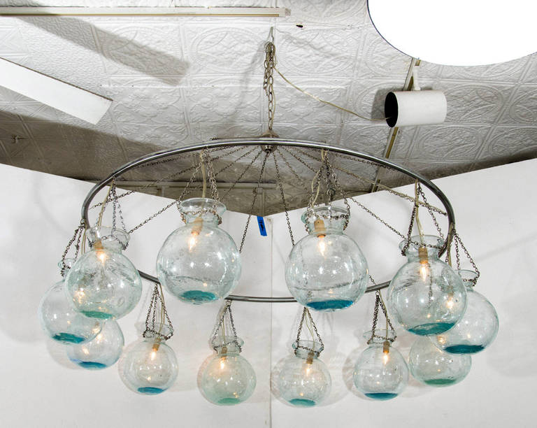 Egyptian handblown glass globe chandelier with our in house silver finish and 7