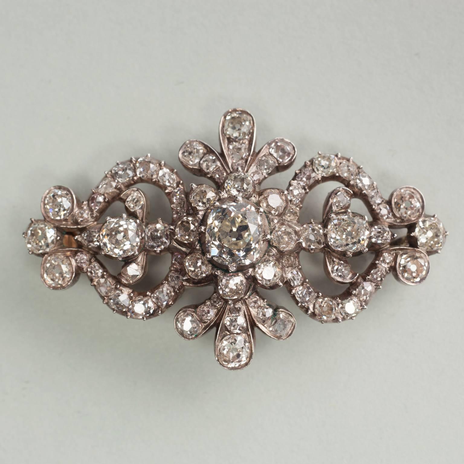 A silver brooch open set with app. 5 carats of old cut diamonds, gold backing, England, circa 1850.

weight: 9.4 grams
dimensions: 5 x 2.9 cm.