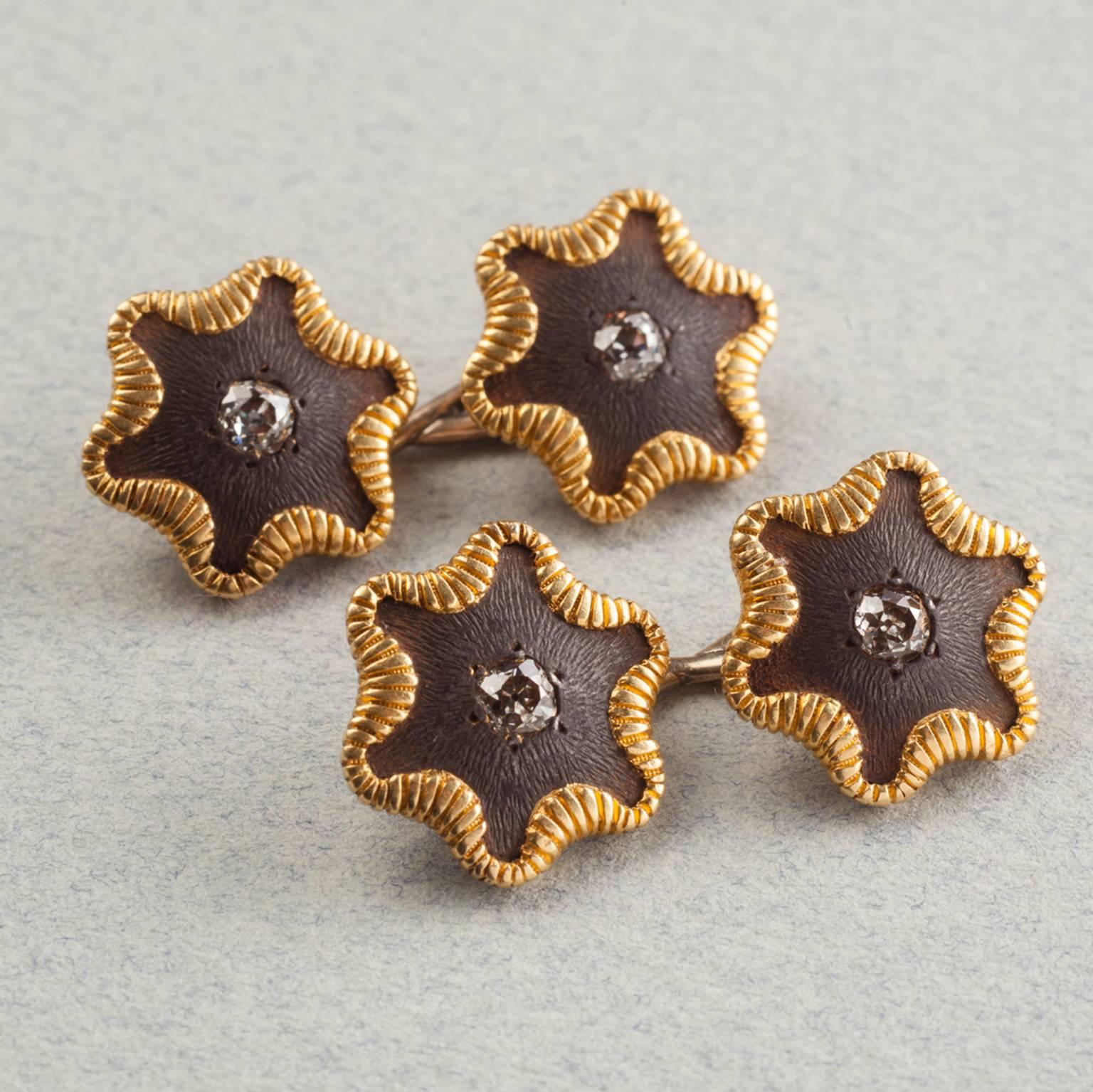 A pair of important 18 carat gold, steel and old cut diamond cufflinks, signed: Tiffany & Co., circa 1880.

Illustrated in the book: 'Cufflinks' by Susan Jonas and Marilyn Nissenson, page: 27.