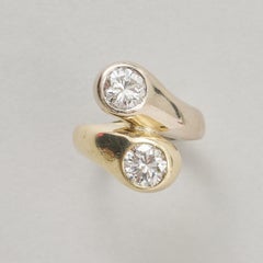 A 14k Bi-Color Toi et Moi ring with Diamond