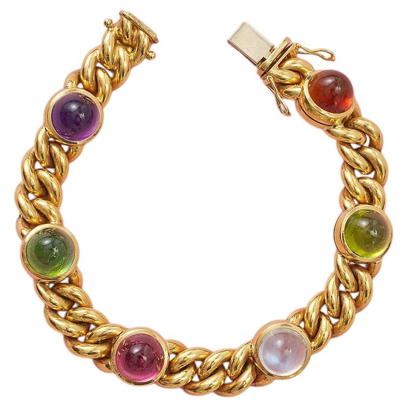 An 18k Gold Curb Link Bracelet with Gemstones For Sale