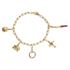 An 18k Gold Cartier Charm Bracelet
