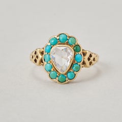 gold heart ring with diamond and turquoise