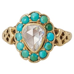 gold heart ring with diamond and turquoise