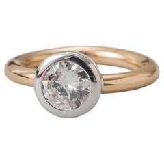 An 18k Gold Solitair Diamond Ring