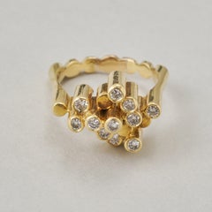 An 18k Gold and Diamond Ring