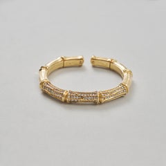 Un bracciale rigido Cartier Bamboo in oro 18 carati con diamanti