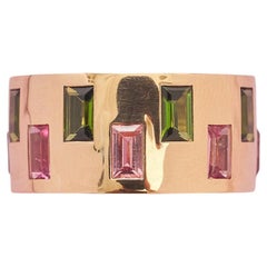 An 18k Gold Band Ring with Green and Pink Tourmaline Baguettes