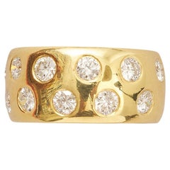 An 18k Gold Band set with Diamonds