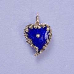 Un pendentif victorien en forme de cœur en or, orné de diamants, monté sur argent et émail