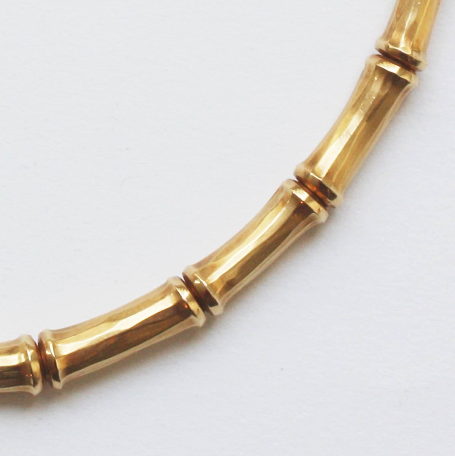 Classic 18-carat gold bamboo necklace, signed and numbered: Cartier, 847558.

weight: 82.5 grams
length: 37 cm
