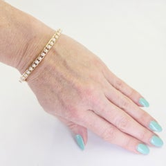 Bracciale rigido in oro giallo 14 carati con perle coltivate da 3 mm, 17 perle