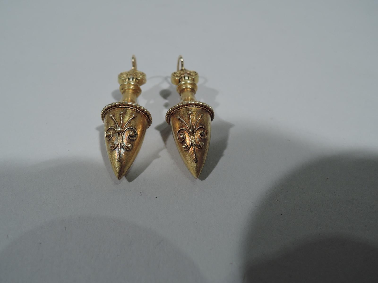 Charming pair of Etruscan Revival 15k gold earrings. Each: Conical urn with domed top. Beading. Filigree volute scrolls on urn and bail. England, ca 1880. 

Height (to bail): 1 3/8 in. 