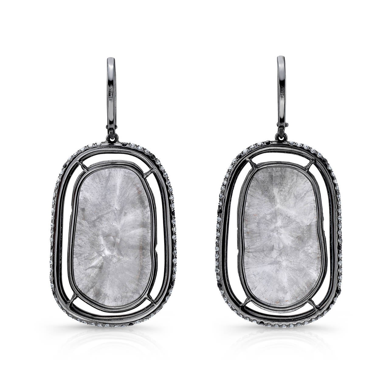 Beautifully faceted milky grey diamond slices resting in a suspended prong setting surrounded with black, champagne and white diamond micro pave. 18 karat blackened white gold.  One of a kind. Diamond Slices, also known as flat diamonds, are a