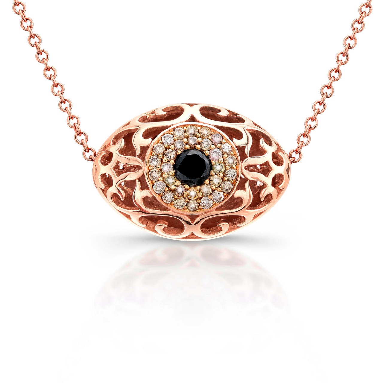 18k rose gold double sided evil eye necklace with champagne, white and black diamond. Flip side has gallery work. Total carat weight 1.20 cts