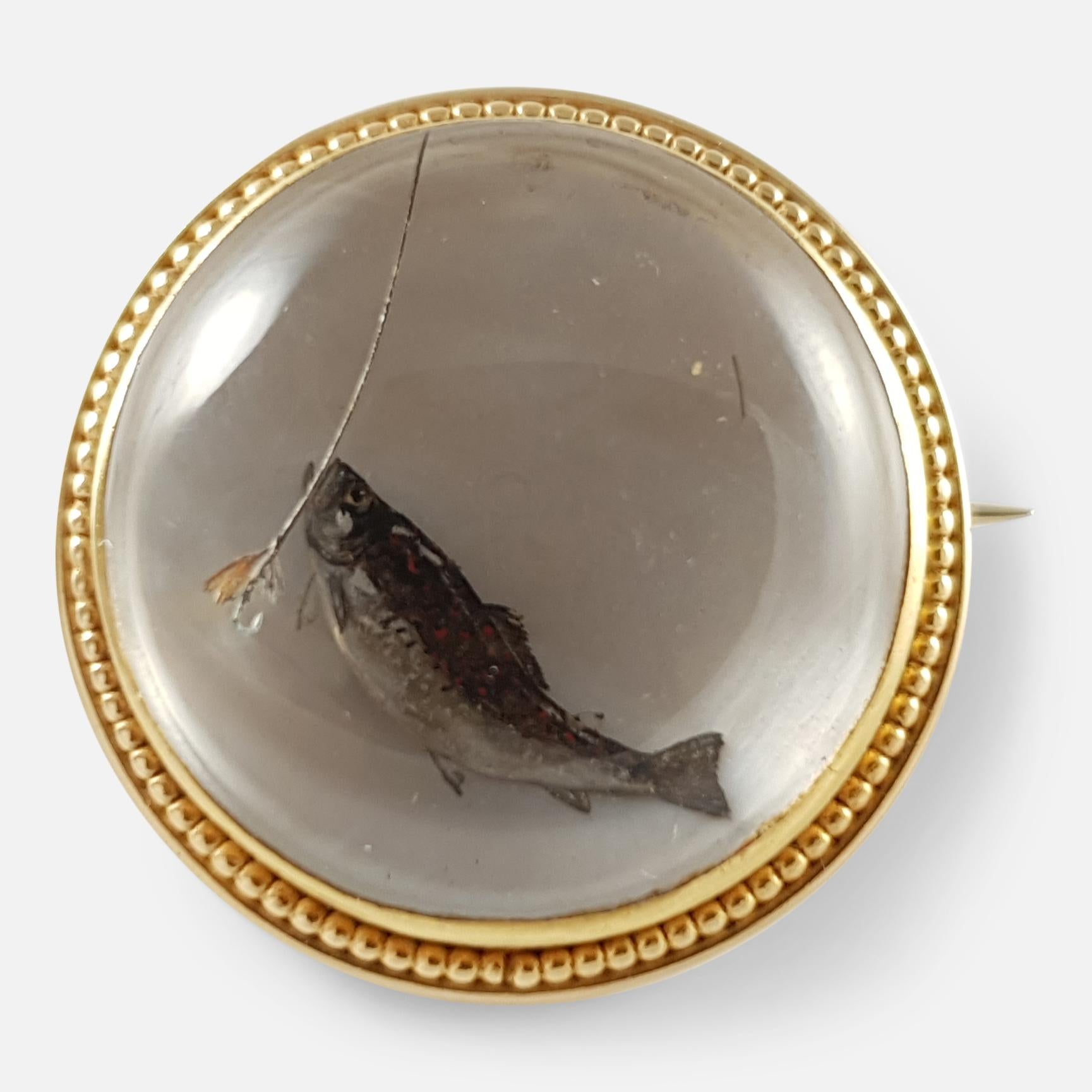 Women's or Men's Early 20th Century 14 Karat Reverse-Carved Crystal Intaglio Fishing Brooch