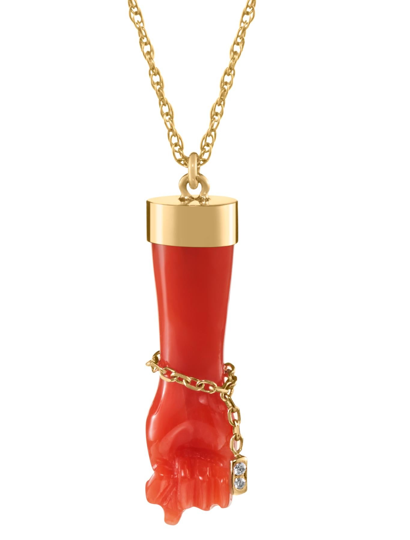 This custom hand carved mediterranean coral pendant necklace uses coral which was sourced from a small family factory in Italy. Each hand is slightly unique, but all are bright red in color with a 14k gold cap. There is a dainty 
