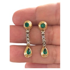 Boucles d'oreilles pendantes en or avec émeraude colombienne et diamant Estate