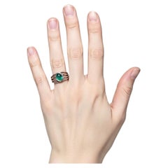Bague solitaire vintage en or blanc 18 carats avec émeraude naturelle