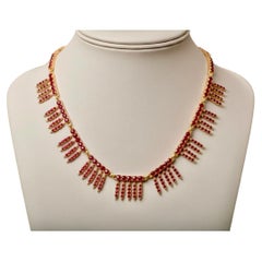 Collar guirnalda de hojas de rubí bañadas por el sol Oro amarillo de 18 quilates