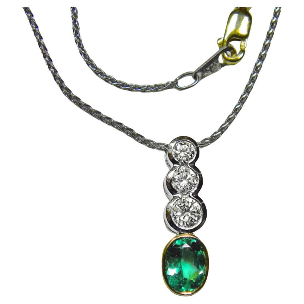 1.50 Carat Emerald Diamond Drop Pendant Necklace Platinum & 18k Gold
Composition: Platinum & 18K Yellow Gold
Primary Stones: Natural Colombian Emerald
Shape or Cut : Oval Cut
Average Color/Clarity : AAA Medium Green/ Clarity VS
Total Emerald Weight