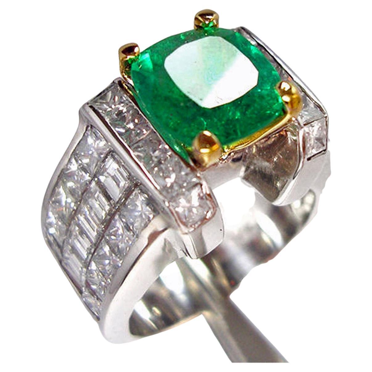 Stunning cocktail estate ring holding a Fine Natural Colombian Emerald and Diamonds, crafted in 18K Gold/ Unisex
Primary Stone: Fine Natural Colombian Emerald
Emerald Cut: Cushion Cut 
Emerald Weight: 2.65 Carats (1 emerald)
Measurements Emerald: