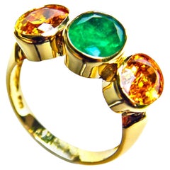 Emerald Yellow Sapphire Three Stone Ring 18 Karat Yellow Gold