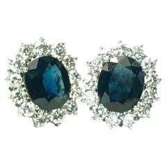 14.00 Carat Oval Cut Sapphire and Diamond Halo Omega Clip Earrings