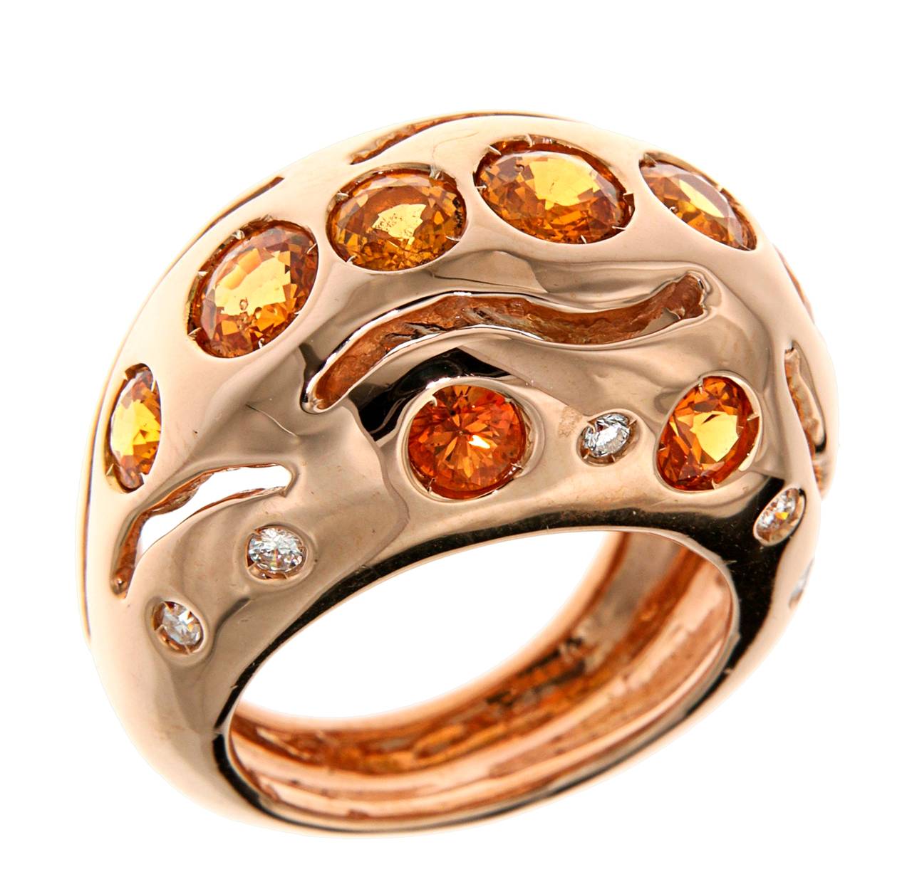 Rose gold 18k ring with orange sapphires 3.90 ctw and diamonds 0.20 ctw 
Finger Size 5 1/2, can be resized. Handcraftd in Italy by Botta Gioielli.
It  is stamped with the Italian Mark 750 - 716MI

Handcrafted in: 18k rose gold.
10 brilliant cut
