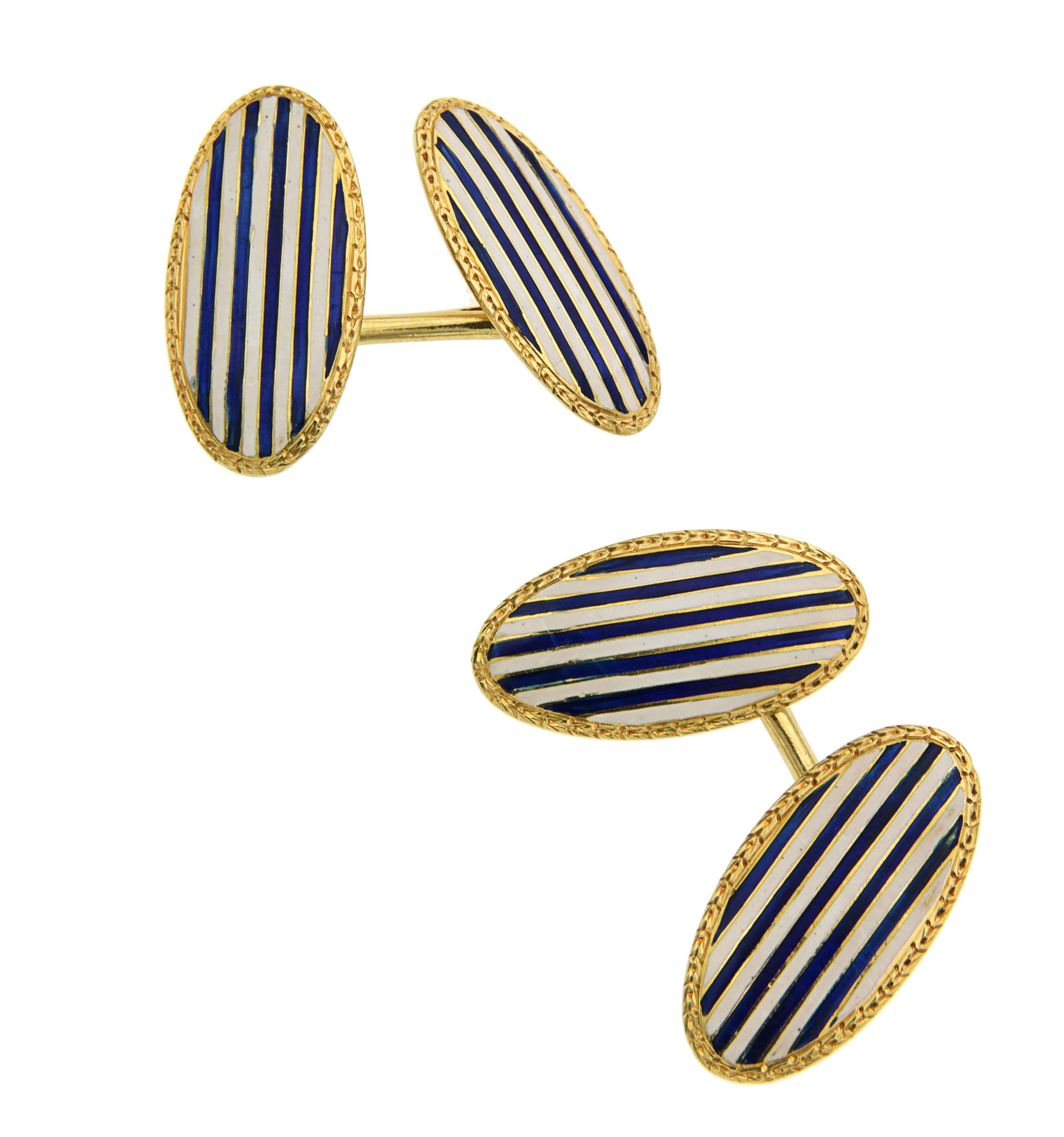 18k gold oval shaped enamel cufflinks 

ovals are 25 mm X 12 mm