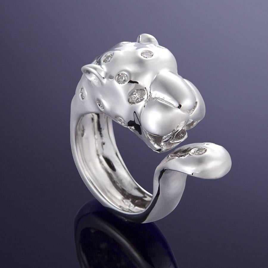 The elegant wild cat inspires Cheetah ring in 18 kt white gold with diamonds. 0.35 ctw.
Total weight 18 grams. Finger size 6, can be sized. Handcrafted in Italy by Botta Gioielli.
It  is stamped with the Italian Mark 750 - 716MI
Ready for delivery.