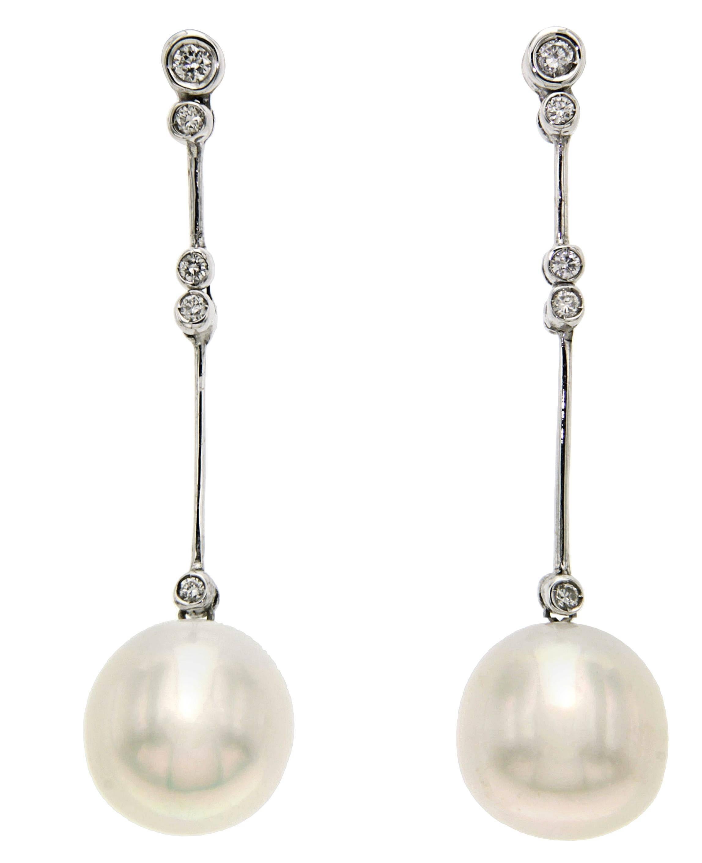 White 18k Gold Earrings with Diamonds 0.25 ctw and Australian Pearls 12 mm AA

Total length 5 cm