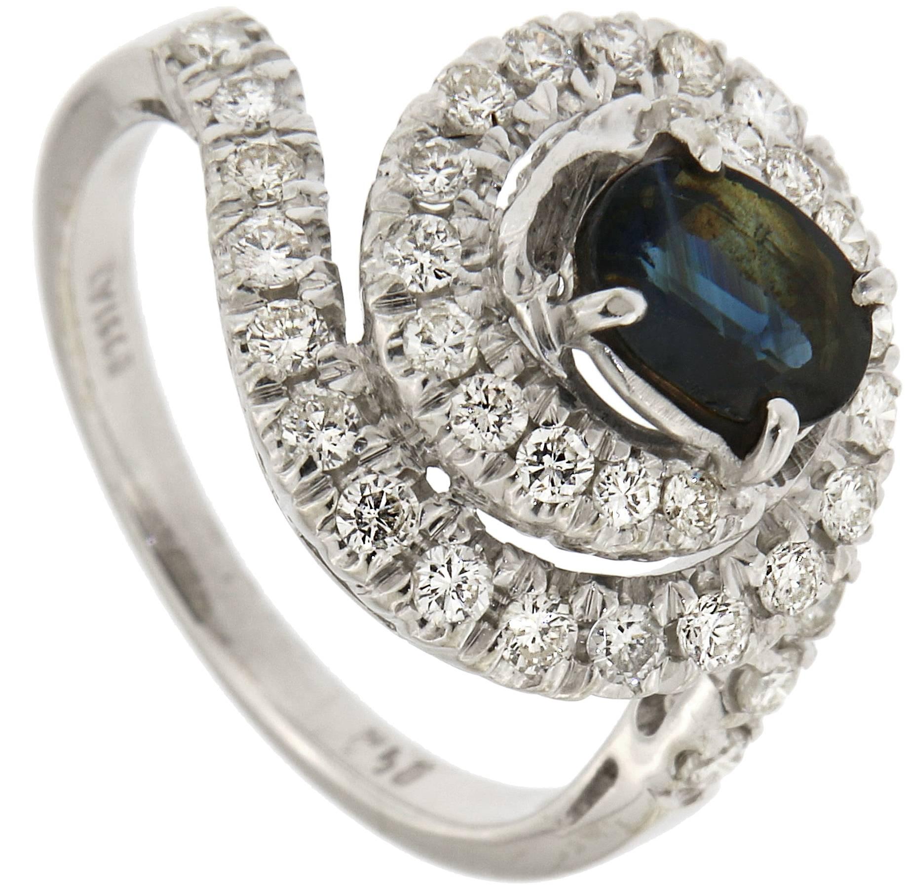 1950s 1.50 Carats Sapphires 0.60 Carat Diamonds 18 carat White Gold Twist Ring