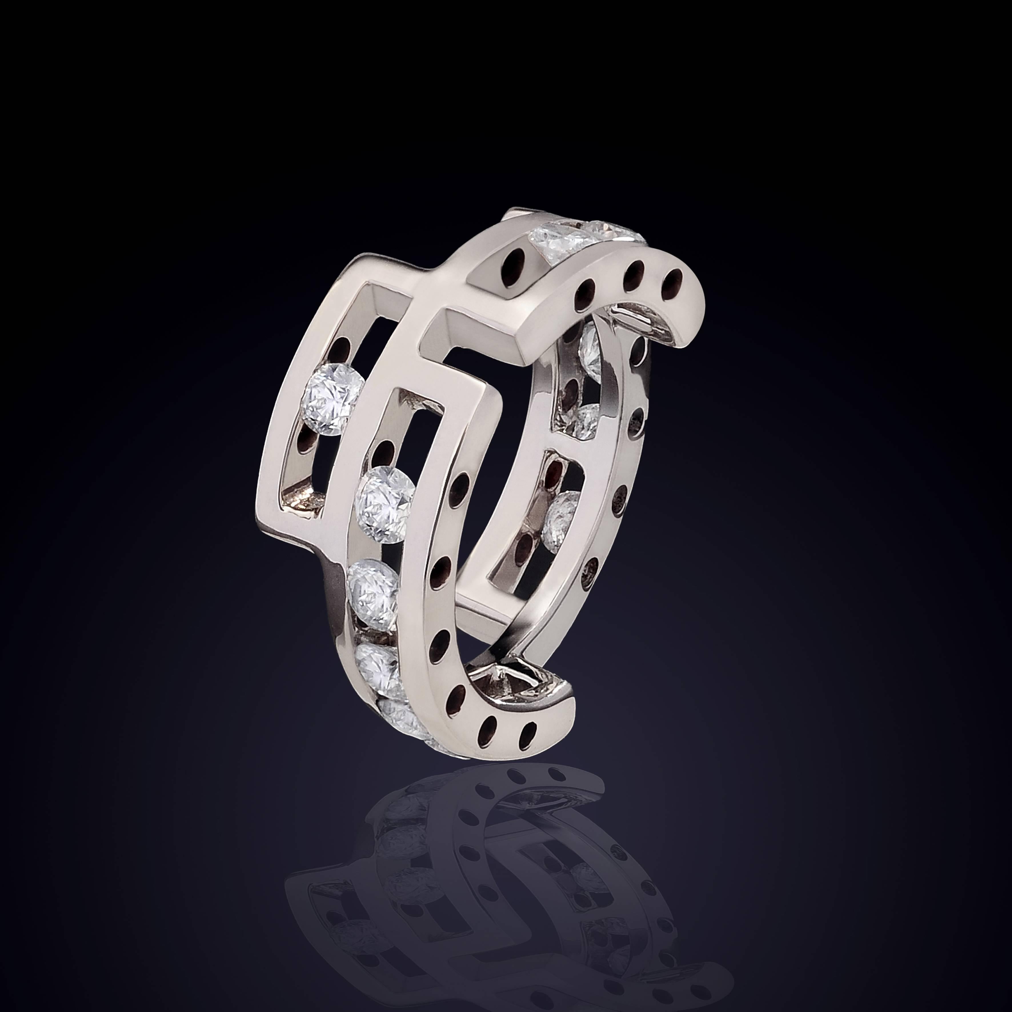 White 18 kt Gold Ring with Ice Diamonds 1.20 Carat. US Size 6.5. 

This distinctive ring is aimed at a sporty and dynamic spirit, designed to create the feeling of movement, as the project name suggests. It is made up of linear elements assembled