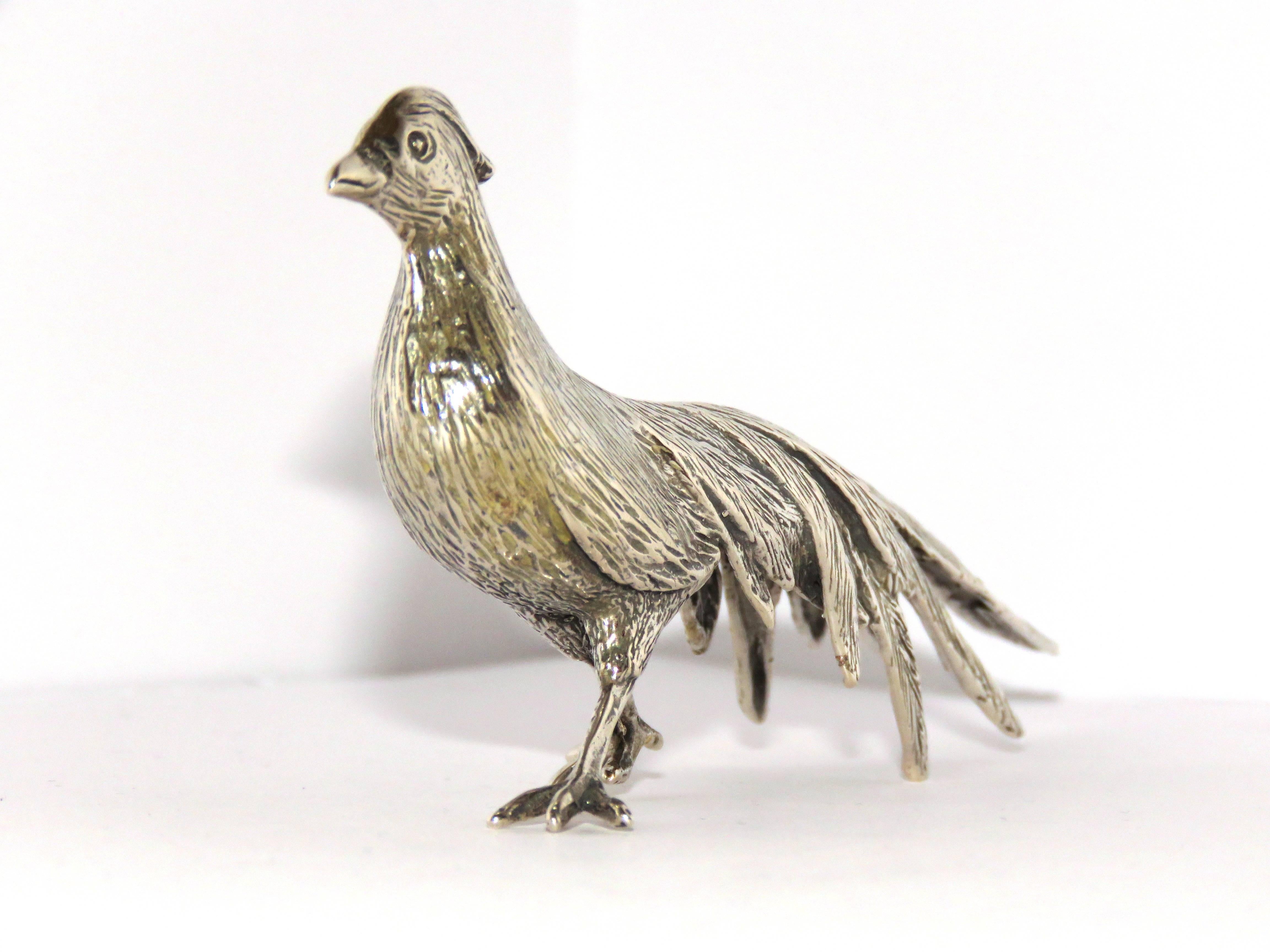 An exceptional fine and impressive vintage cast sterling silver model of a peacock.
This vintage silver peacock ornament has been embellished with details reproducing the Fine definition of the peacock's coat and anatomical features.
Dimensions: