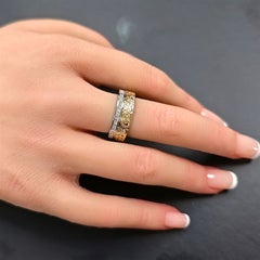 Bague en or jaune et blanc sertie d'un diamant de 1,29 carat