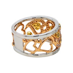 0.67 Carat Pink, Yellow, White Diamond Rose, Yellow, White Gold Ring