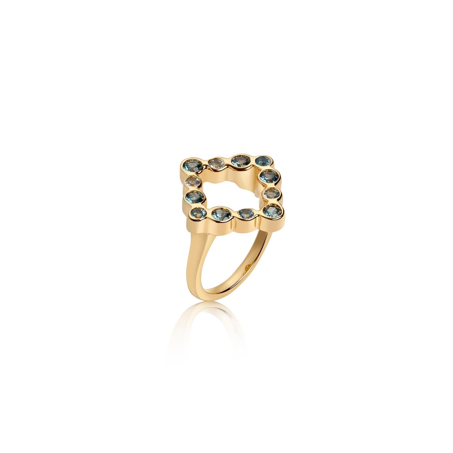Wear this open kite shape shape ring composed of Hi June Parker's signature organic circles filled
with gemstones to celebrate your sense of equality.

Inspired by seeing the cross-section view of life, as if slicing a tree to see its underlying