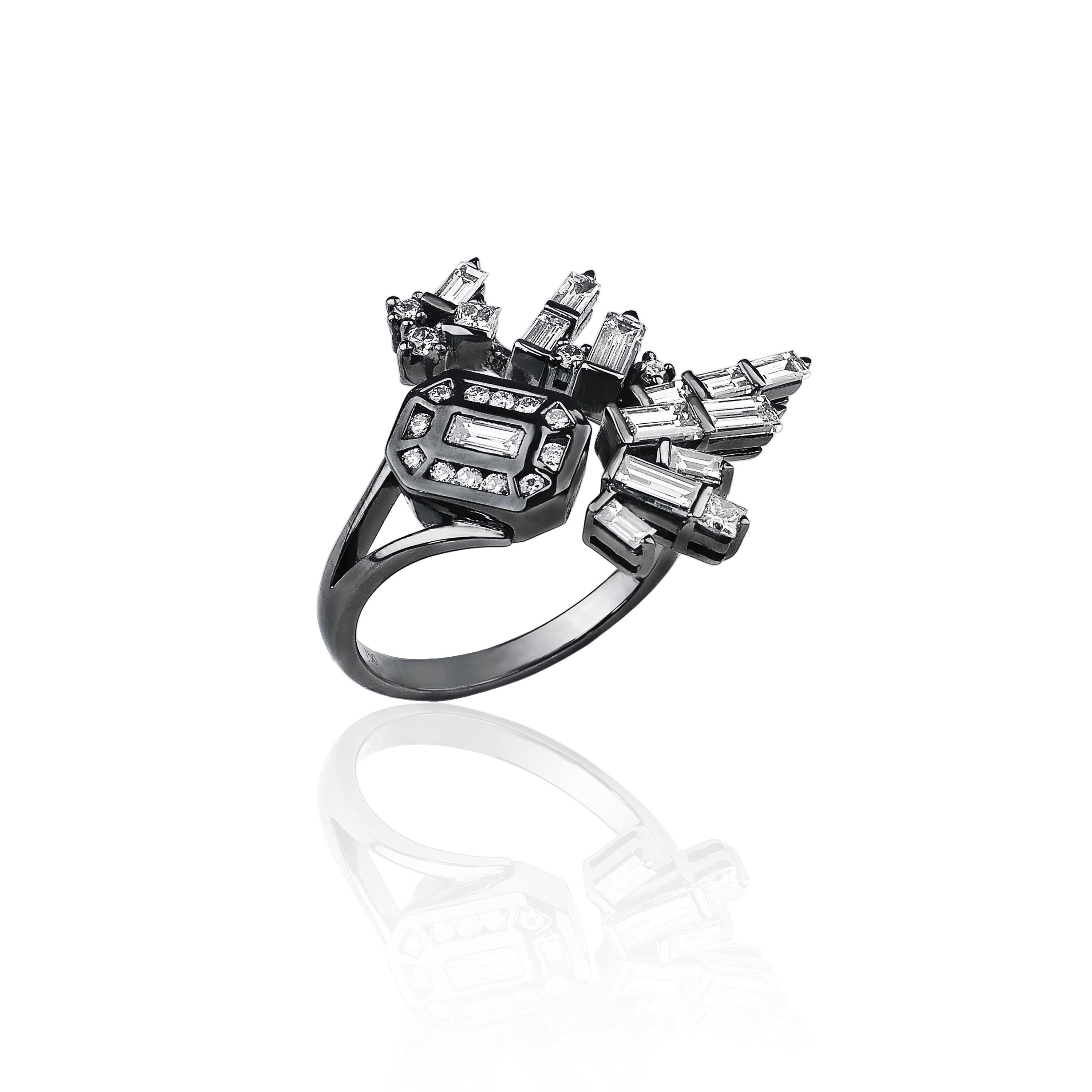 The Cosmic jewellery creations gather baguette, round and square-cut diamonds, coming together in a sparkling constellation.
Made of 18K white gold, each piece has black rhodium plating enhancing the radiance of the white diamonds, while echoing the