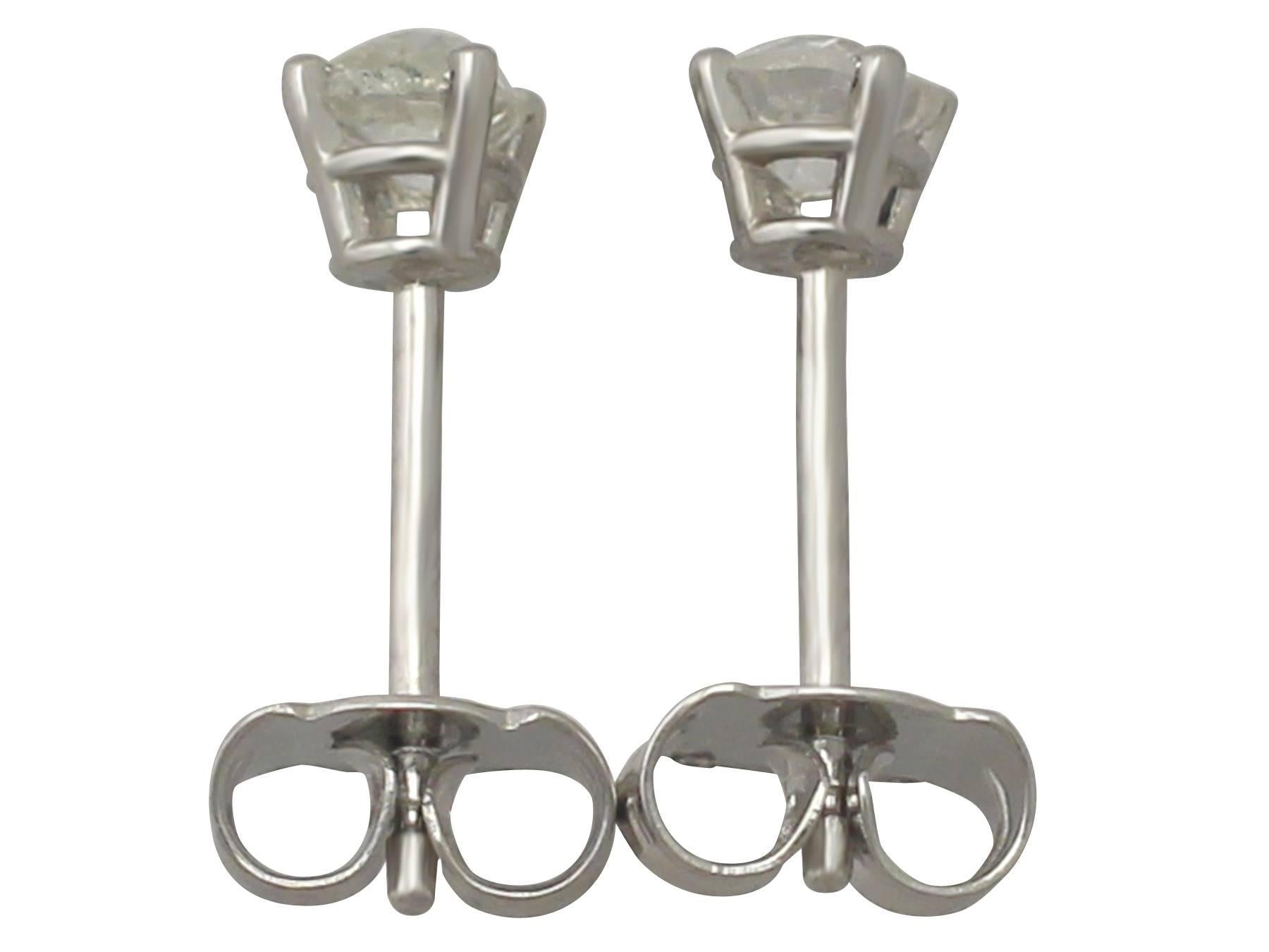 Contemporary 0.56 Carat Diamond and Platinum Stud Earrings