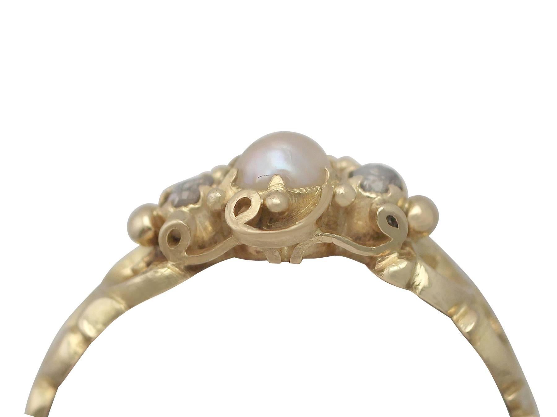 This fine and impressive pearl and diamond ring haws been crafted in 18k yellow gold.

The pierced decorated, organic scrolling leaf design mount is ornamented with a feature 4mm natural pearl (strong probability) flanked on either side by a four