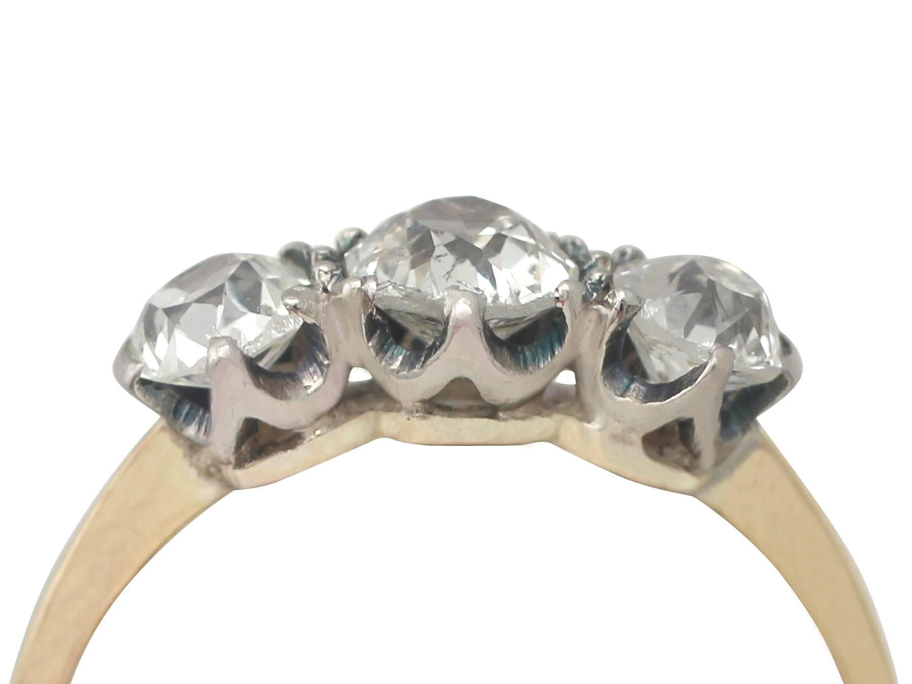 This fine and impressive antique 1920's diamond ring has been crafted in 18k yellow gold with a platinum setting.

The pierced decorated, platinum setting is ornamented with a feature 0.65 ct Old European round cut diamond

The feature diamond