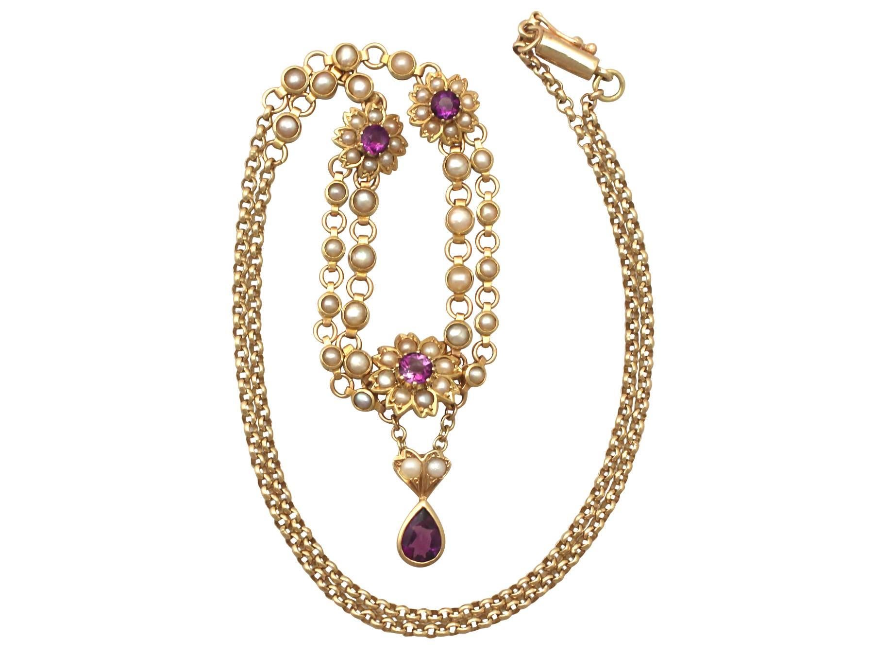 This fine and impressive antique necklace has been crafted in 9K yellow gold.

The 9K yellow belcher chain supports a pearl embellished design accented with three floral motifs, the central flower head being the largest.

Each of the flowers is