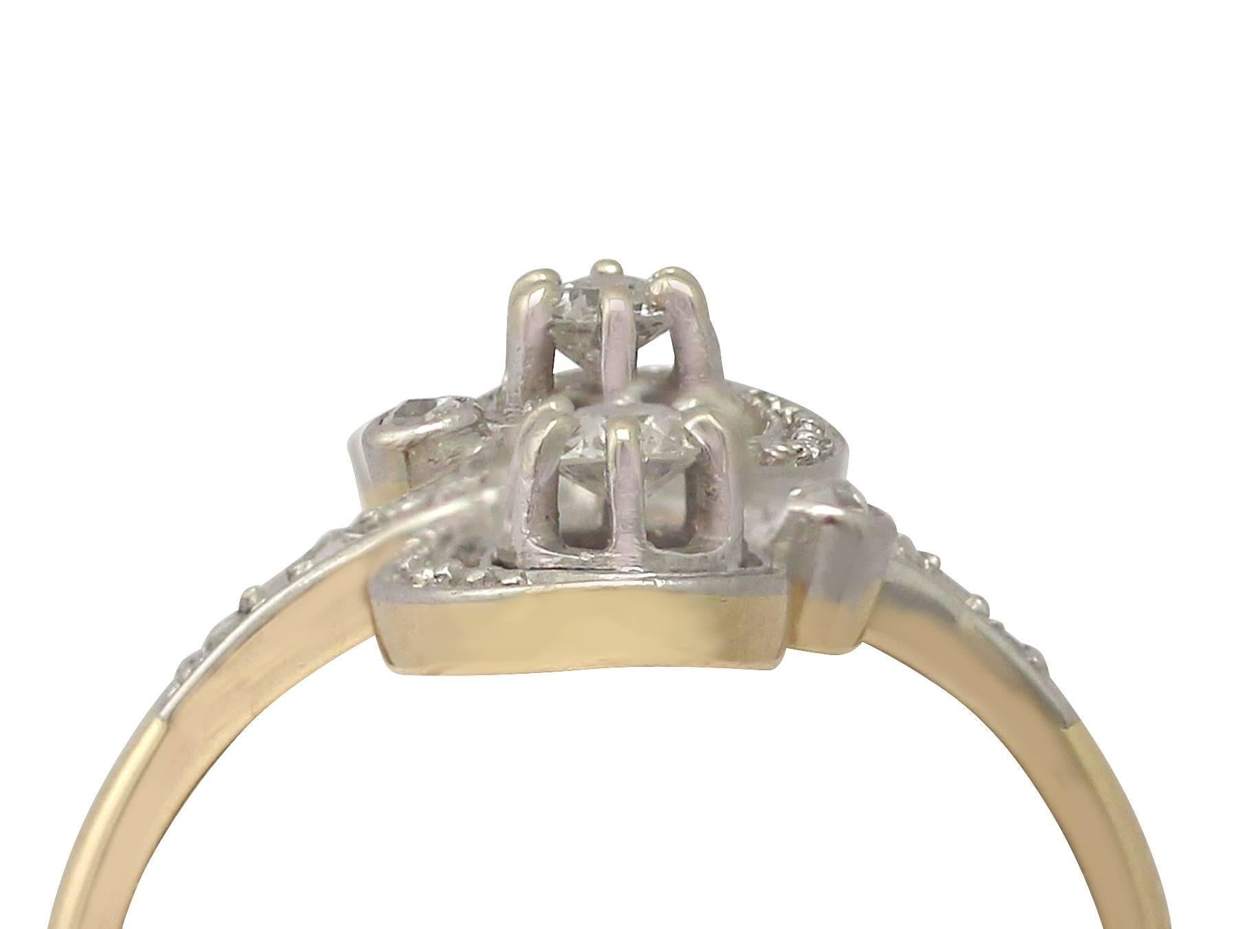 This fine and impressive antique diamond twist ring has been crafted in 18k yellow gold with an 18k white gold setting.

The pierced decorated claw settings display two Old European round cut diamonds claw set vertically on a twist.

The feature
