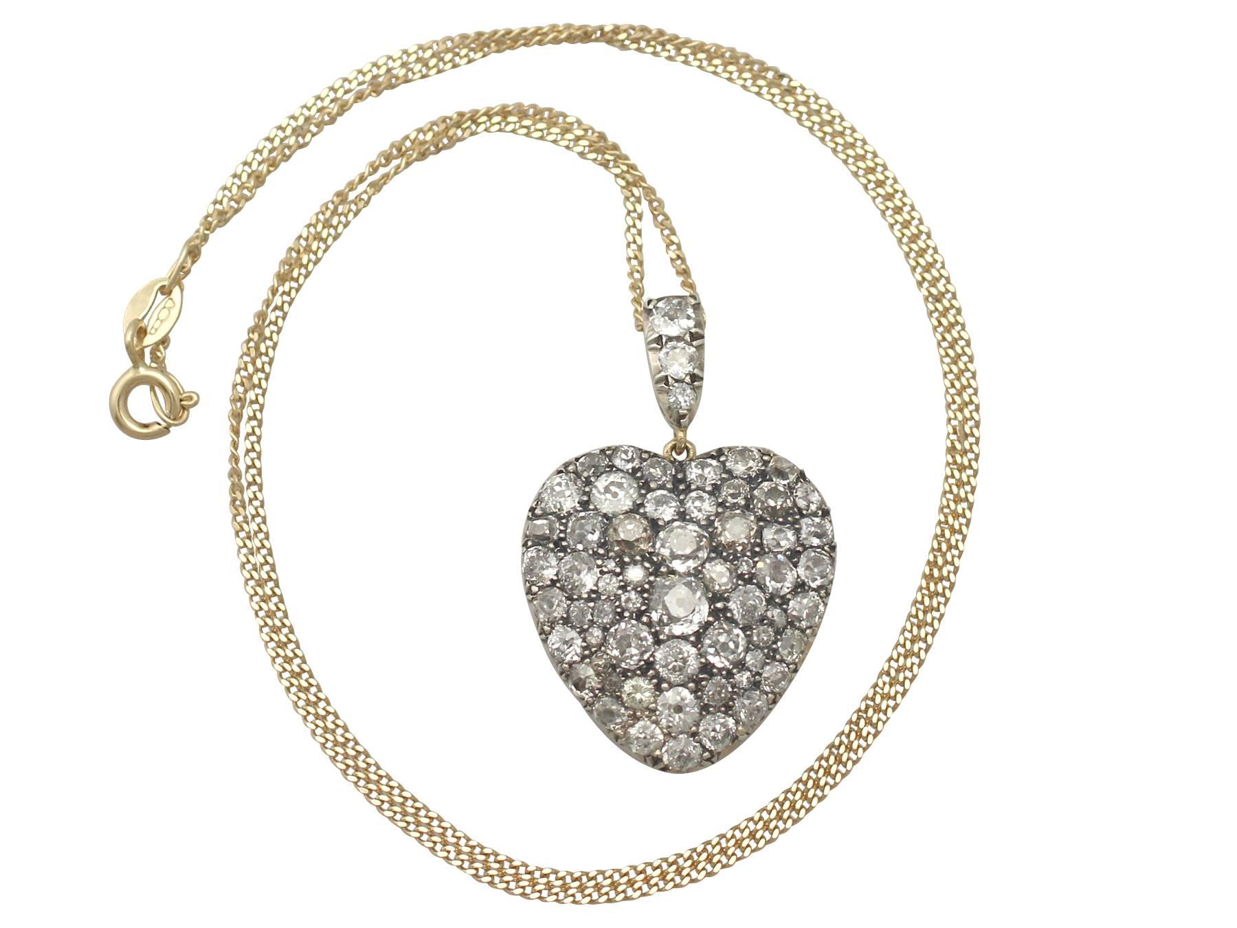 A stunning, fine and impressive antique Victorian 7.95 carat diamond and 15 karat yellow gold, silver set heart shaped pendant; part of our diverse antique jewellery collections

This stunning, fine an impressive antique diamond heart pendant has